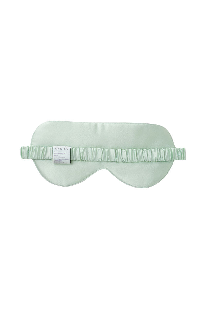 Green silk eye mask from MANITO's MBTI SILK EYE MASKS collection, soft and comfortable for restful sleep.