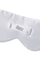 Grey MANITO MBTI silk eye mask with soft fabric and elastic band for comfortable sleep or relaxation.