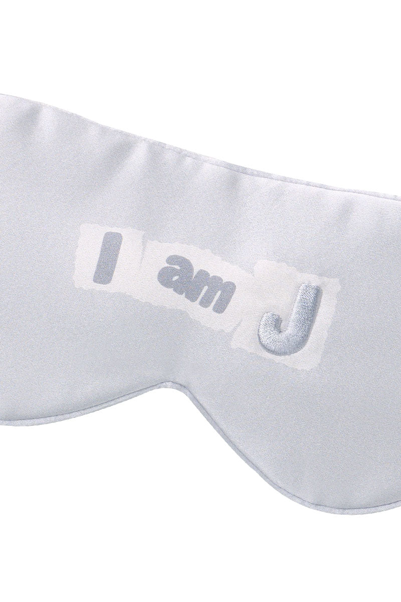 Grey MANITO MBTI silk eye mask with soft fabric and elastic band for comfortable sleep or relaxation.