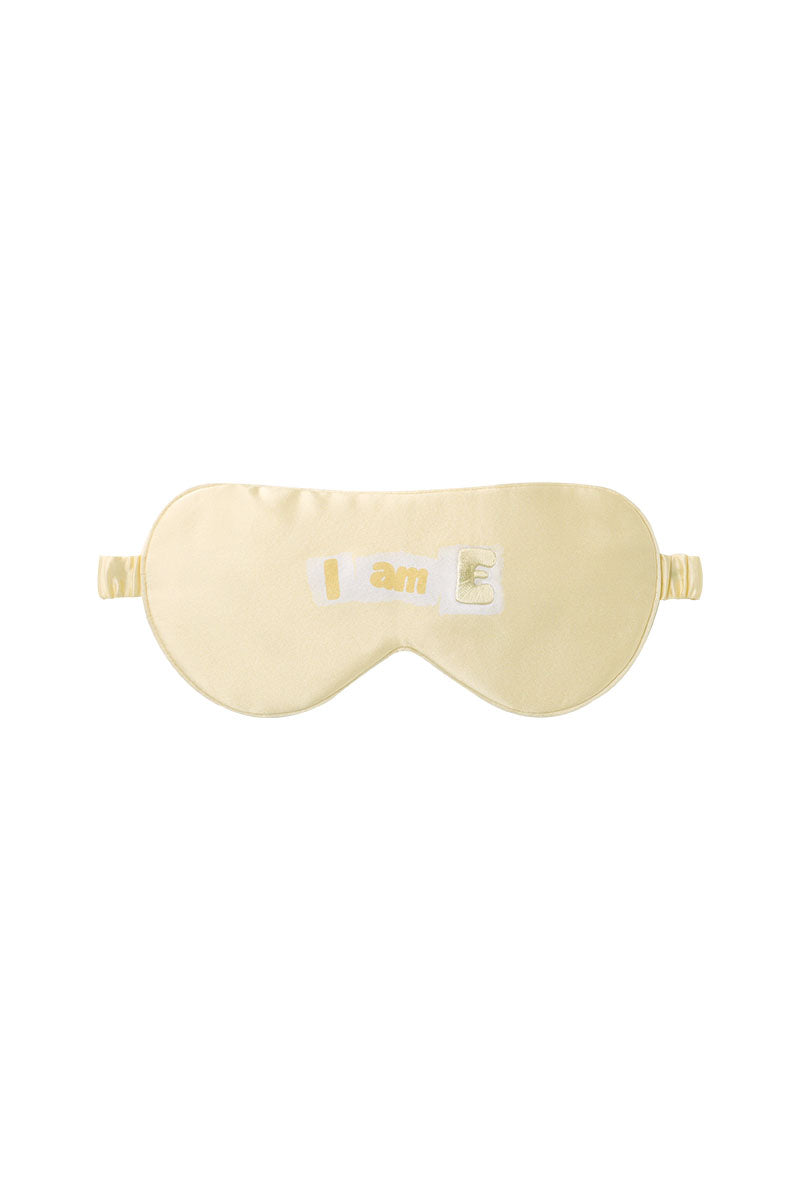 Yellow silk eye mask from MANITO MBTI collection, soft and comfortable for relaxation or sleep.