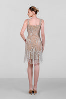 Beaded contour fringe mini dress by Monika Dimova featuring intricate beadwork and fringe detailing, perfect for stylish evening wear.