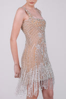 Beaded contour fringe mini dress by Monika Dimova featuring intricate beadwork and fringe details on a stylish dress.