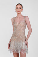 Beaded fringe mini dress by Monika Dimova, featuring intricate beadwork and a stylish, flirty silhouette for evening wear.