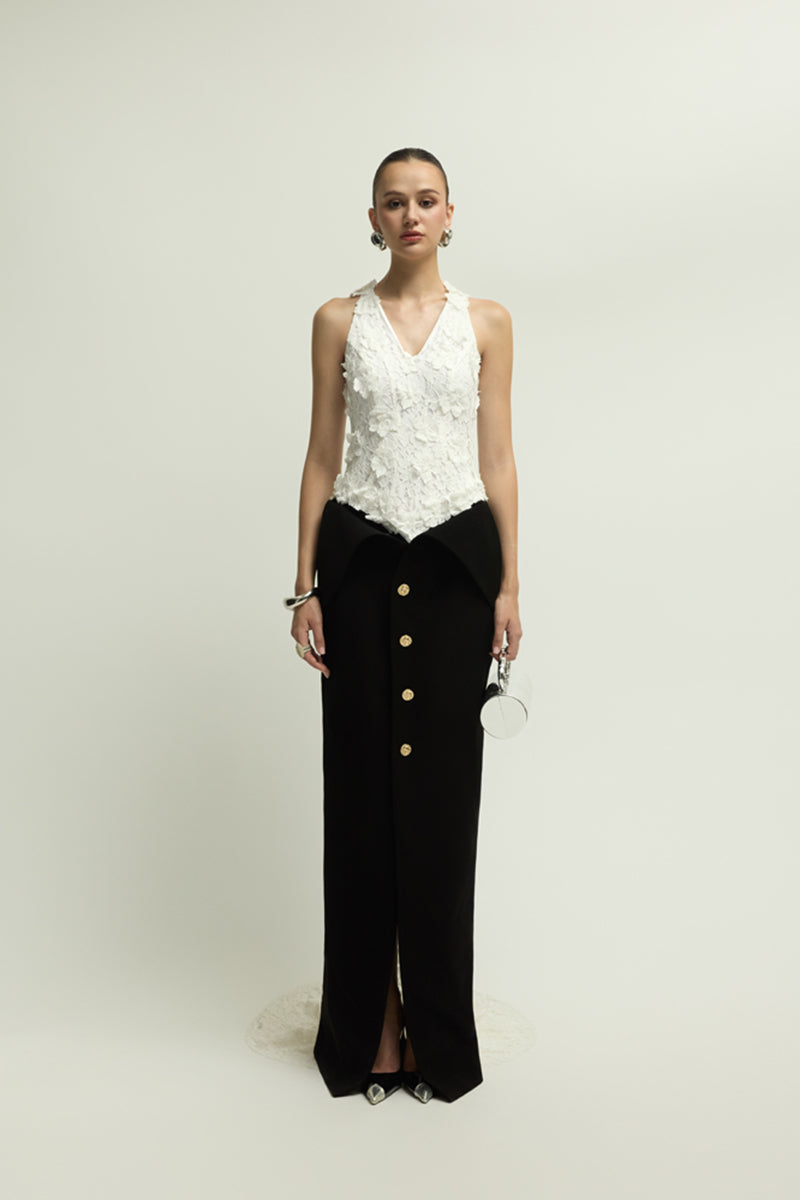 Elegant black and white Metz dress by Jenny K Tran, featuring a stylish gown with a sophisticated design and flowing fabric.
