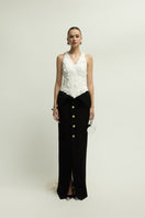 Elegant black and white Metz dress by Jenny K Tran, featuring a stylish gown with a sophisticated design and flowing fabric.