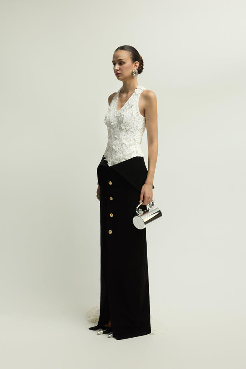 Black and white Metz gown by Jenny K Tran, elegant evening dress with a flowing silhouette and intricate detailing.