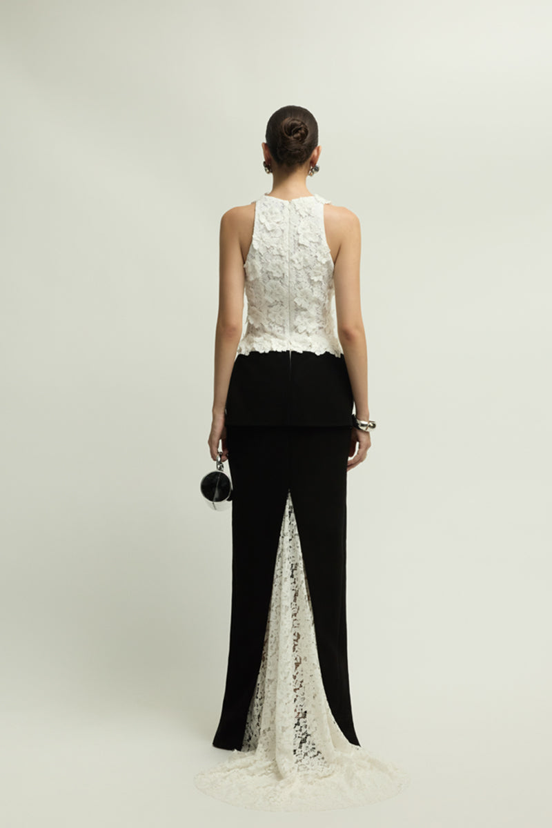 Black and white Metz dress by Jenny K Tran, elegant gown with intricate pattern, displayed on a mannequin.