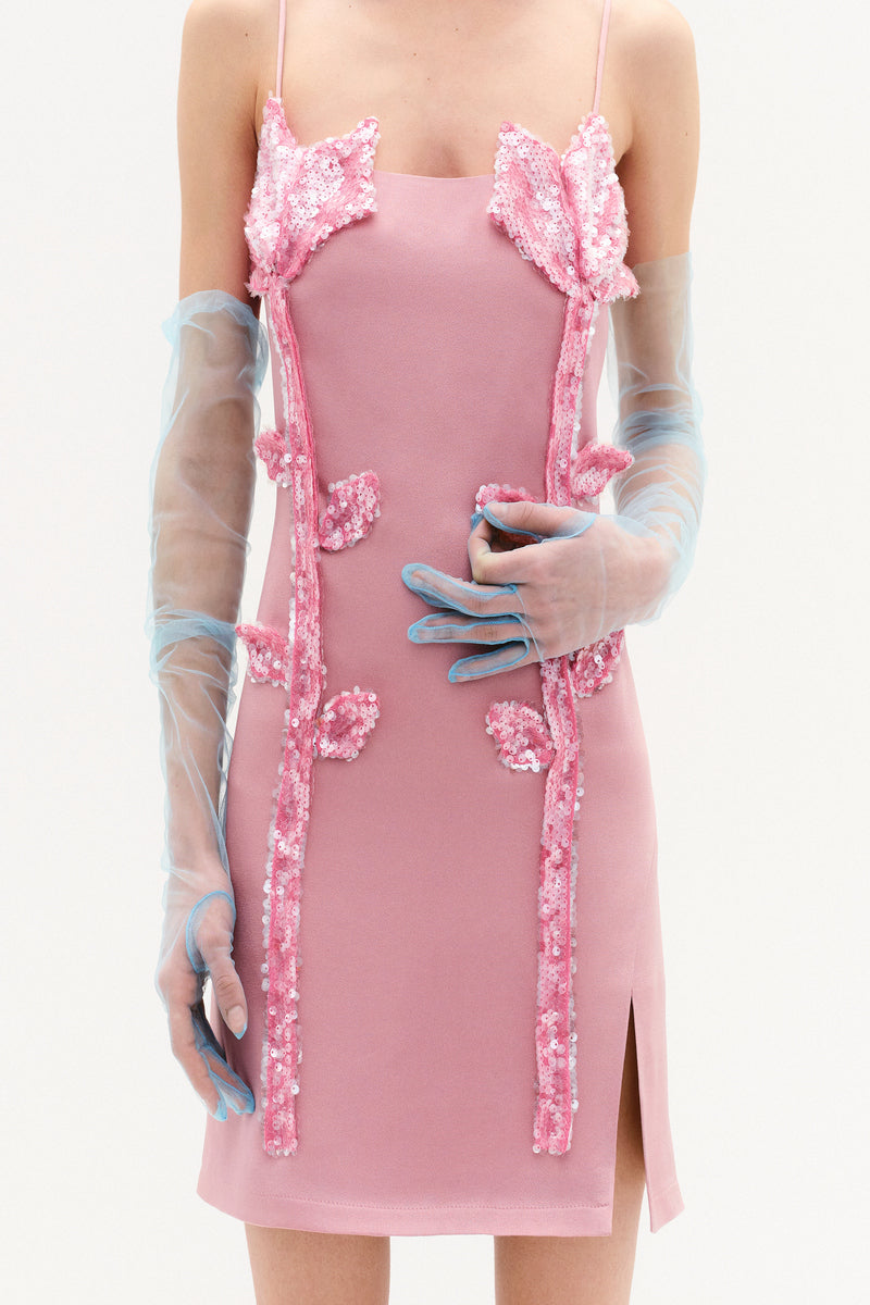 Peony pink mini dress by Malva Florea with floral sequined appliqués, showcasing a stylish and elegant design.