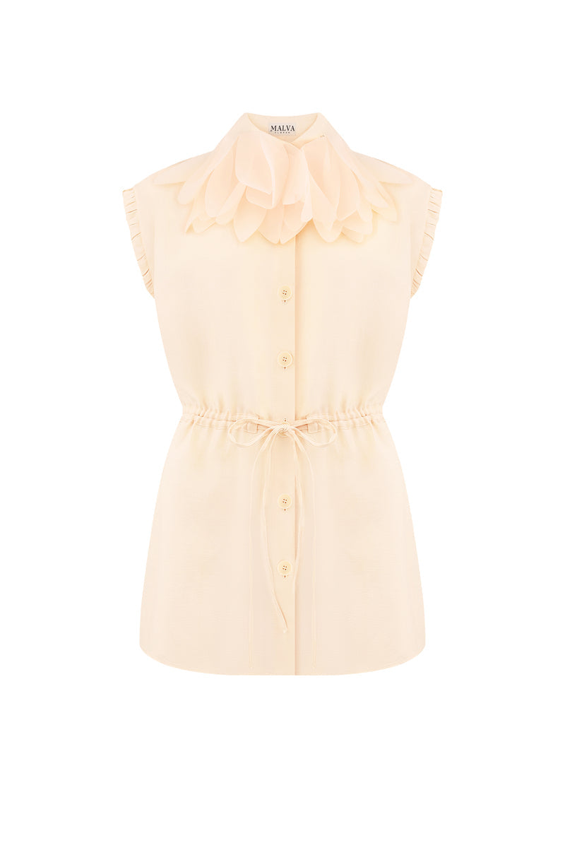 Light blue sleeveless button-up blouse by Malva Florea, front view showing collar and button details.
