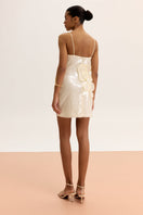 Yellow sequined mini dress by Malva Florea, featuring a fitted silhouette and shimmering sequin details.