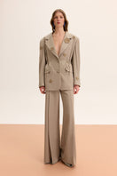 Relaxed fit flower detail blazer by Malva Florea, shown with floral pattern and tailored collar, stylish jacket for women.