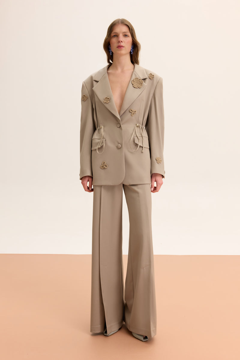 Relaxed fit flower detail blazer by Malva Florea, shown with floral pattern and tailored collar, stylish jacket for women.