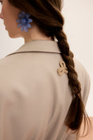 Malva Florea relaxed fit flower detail blazer, stylish jacket with floral accents, shown in a natural pose on a model.