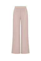 Back view of Malva Florea bias-cut pants in a flowing fabric, showcasing their elegant drape and tailored fit.
