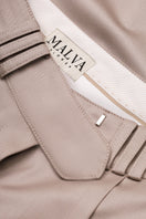 Bias-cut MALVA FLOREA pants in a close-up image showcasing the fabric detail and tailored fit.
