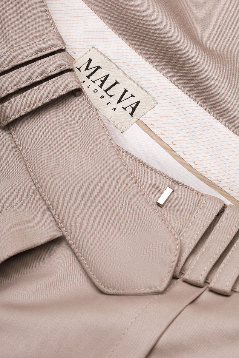 Bias-cut MALVA FLOREA pants in a close-up image showcasing the fabric detail and tailored fit.