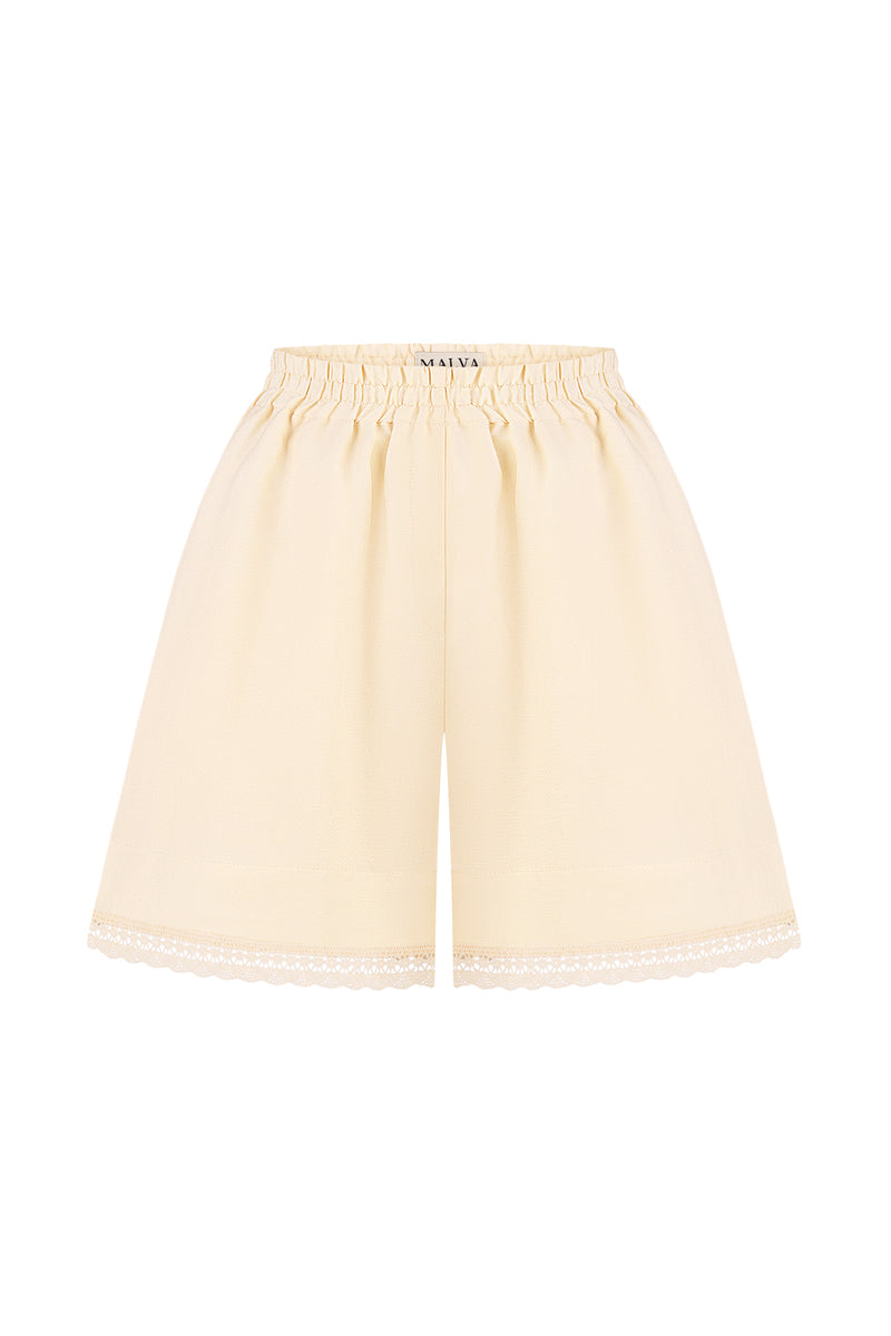 Front view of MALVA FLOREA matching high-waisted shorts pants with a sleek fit and floral design, made from lightweight fabric.