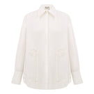Relaxed-fit ivory blouse by Malva Florea, casual shirt with soft fabric and stylish design, shown on a model.