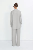 Relaxed-fit gray blouse by Malva Florea, featuring a casual design with soft fabric and a comfortable fit.