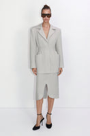 Gray high-rise midi skirt by Malva Florea, featuring a sleek, fitted design ideal for casual or office wear.
