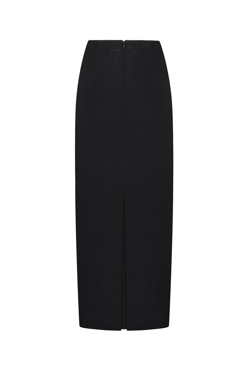 Black fitted maxi skirt by Malva Florea, showing a full-length view of the sleek, tailored design and smooth fabric.