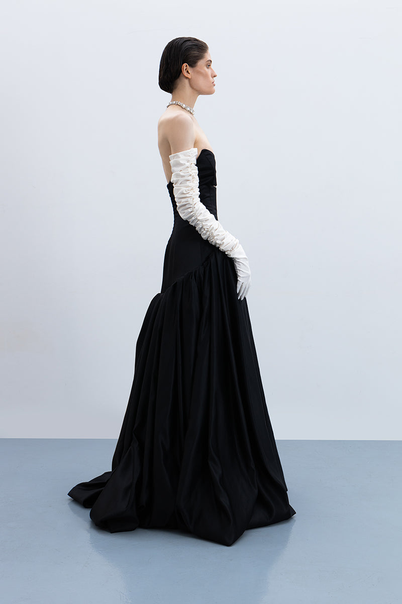 Elegant black Maxi gown by Monetre featuring a flowing silhouette and stylish design, suitable for formal occasions.