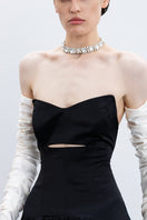 Black Monetre maxi gown featuring a flowing silhouette and elegant design, perfect for formal occasions.