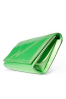 Lime green Terry de Havilland Mia clutch bag with sleek design and compact size, perfect for stylish evenings or events.