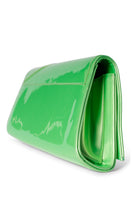 Lime green Terry de Havilland MIA clutch bag with sleek design, featuring a compact shape and stylish finish.