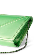 Lime green Terry de Havilland Mia clutch bag with sleek design and compact size, perfect for evening or special occasions.