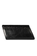 Black glitter clutch bag by Terry de Havilland, sleek and stylish accessory with a shimmering surface, perfect for evening wear.