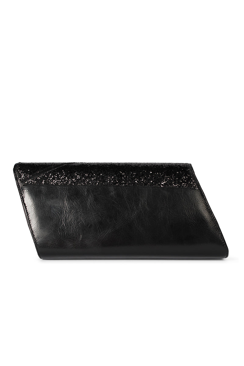 Black glitter clutch bag by Terry de Havilland, sleek and stylish accessory with a shimmering surface, perfect for evening wear.