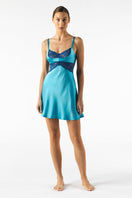 Silk chemise nightgown in cerulean with delicate cradled bust design by NK IMODE, showcasing smooth, luxurious fabric.