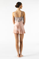 NK Imode Mireille baby doll silk chemise in rose gold, featuring smooth satin fabric and delicate lace details.