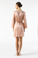 NK IMODE Mireille short silk robe in rose gold, featuring a luxurious silky fabric and elegant fit, displayed on a hanger.