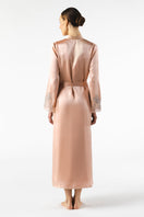NK IMODE Mireille long silk robe in rose gold, featuring a flowing design and elegant fabric, displayed on a hanger.