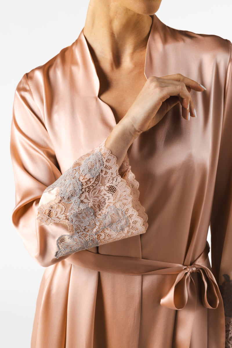 NK IMODE Mireille long silk robe in rose gold, flowing design with delicate fabric and elegant drape, displayed on a mannequin.