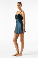Silk baby doll chemise in Stardust color by NK IMODE, featuring delicate lace details and a flowing, elegant nightgown silhouette.