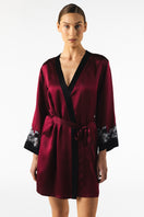 NK Imode Roxy short silk robe in Bordeaux displayed on a hanger, showcasing smooth fabric and elegant design.