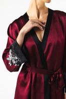 NK IMODE Roxy Short Silk Robe in Bordeaux, featuring luxurious silk fabric and a stylish, relaxed fit.