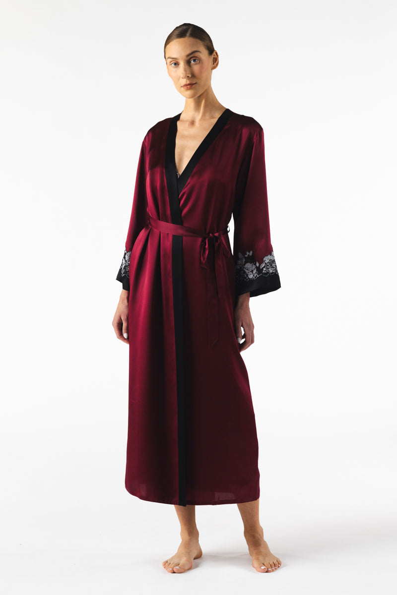NK IMODE Roxy long silk robe in Bordeaux, featuring elegant draping and luxurious fabric, displayed on a hanger.
