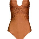 Laura Escobar Serrania one-piece swimsuit in terracotta, featuring a stylish design and comfortable fit, displayed on a model.