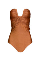 Laura Escobar Serrania one-piece swimsuit in terracotta, featuring a stylish design and comfortable fit, displayed on a model.
