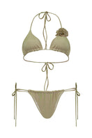 Gold Laura Escobar Selina bikini top with adjustable straps and sleek design, shown on a model.