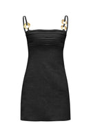Black LAURA ESCOBAR SUN mini dress displayed on a hanger, featuring a sleek, fitted design ideal for casual or evening wear.