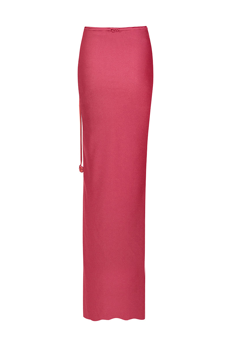 Pink and purple Pitaya Dragonfruit maxi skirt by Laura Escobar, flowing fabric with vibrant tropical print, styled on a mannequin.