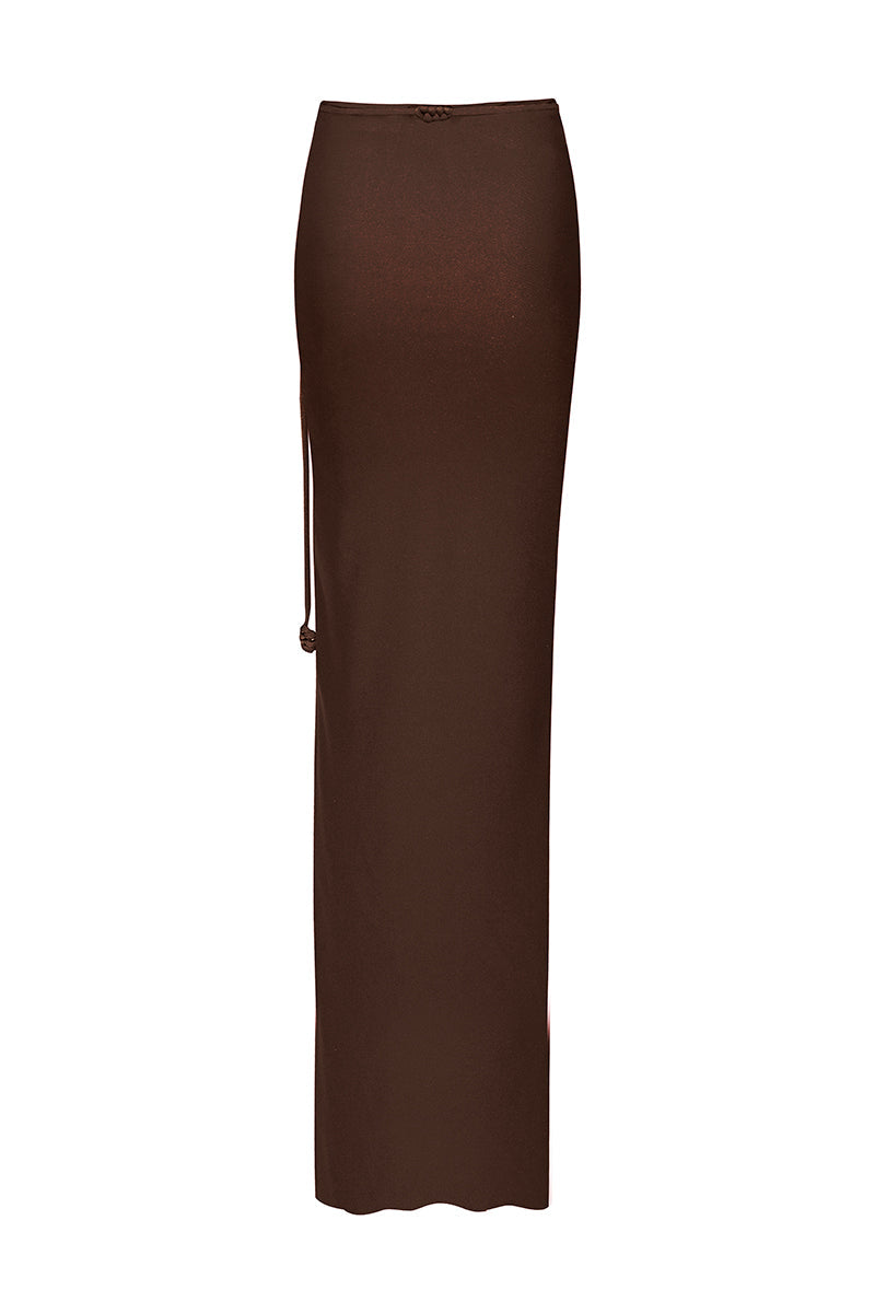 Laura Escobar Pitaya Mocca maxi skirt shown in café color, flowy fabric, and elegant design perfect for stylish summer outfits.