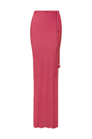 Laura Escobar Pitaya dragonfruit maxi skirt with vibrant pink and green floral patterns, flowing fabric, and high-waisted design.