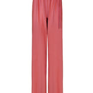 Light coral Flora pants by Laura Escobar, showing relaxed fit, waistband, and soft fabric texture.