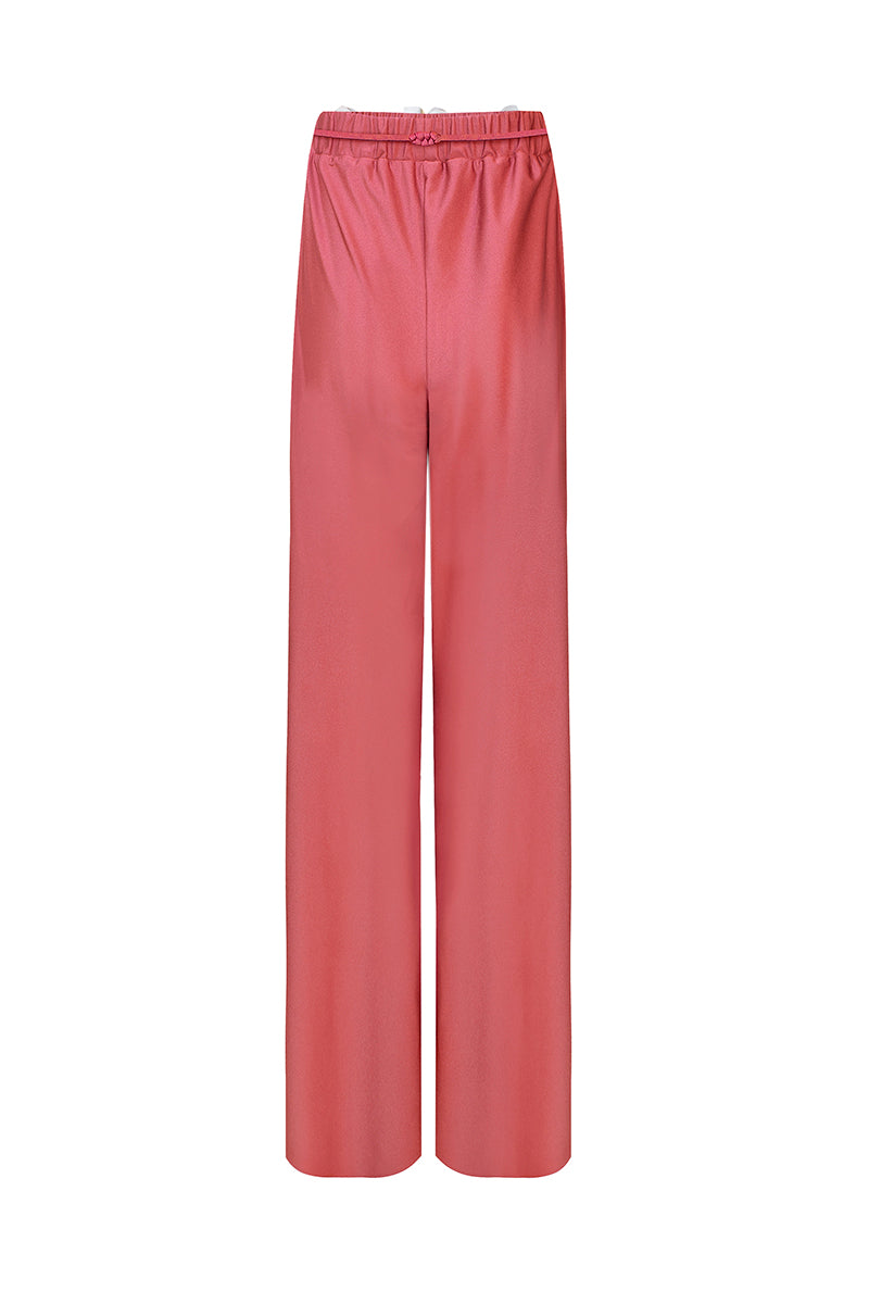 Laura Escobar Flora pants in coral, stylish women's pants with a vibrant color and comfortable fit, shown in the image.